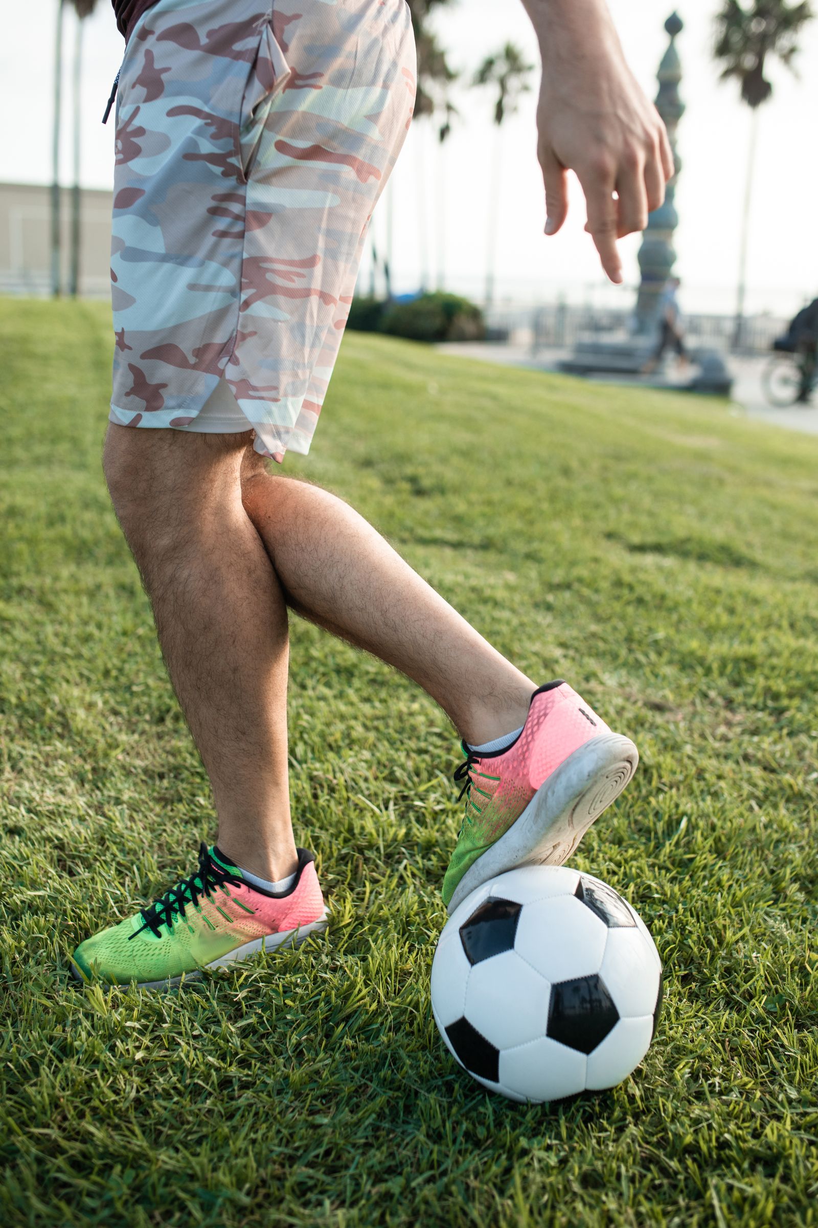 Illustrative stock photograph of a player with a soccer ball